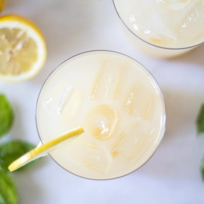 sparkling whiskey lemonade with basil and mint